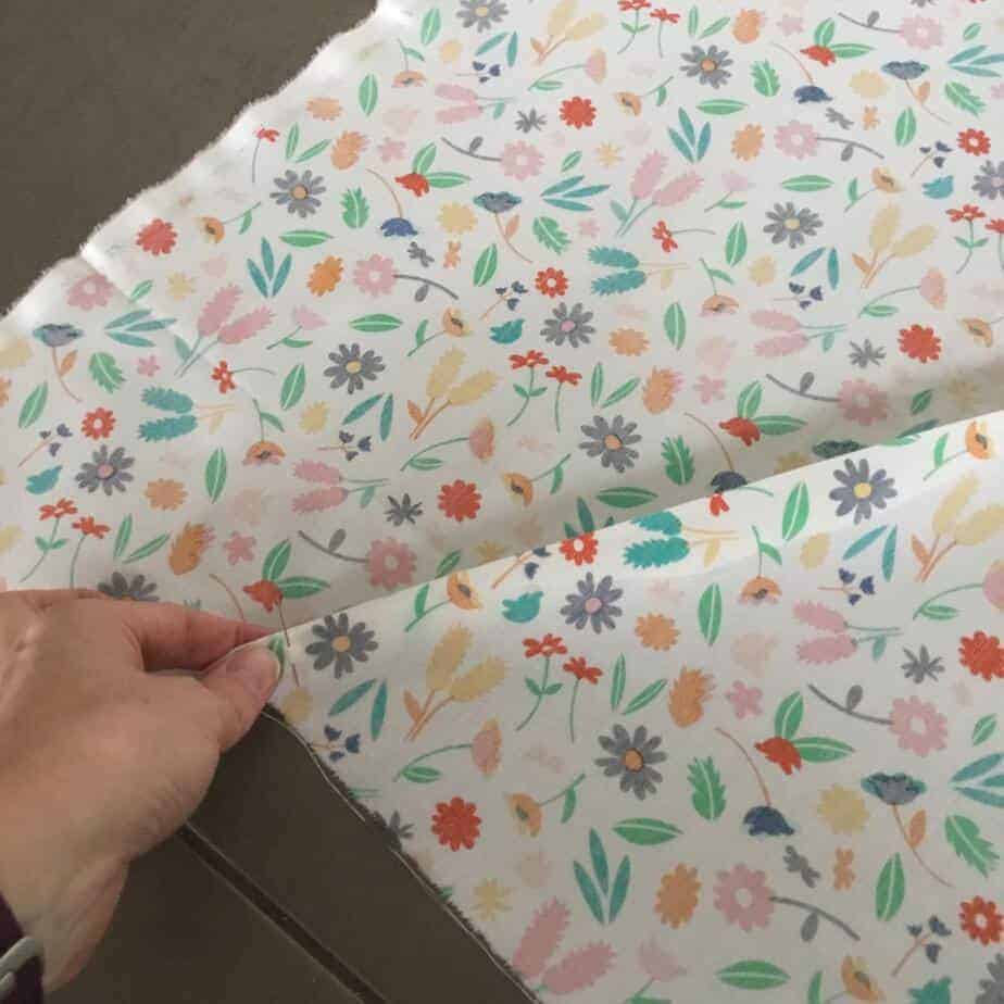 Picture Tutorial for piecing a quilt back diagonally, a great way of stretching fabric further!