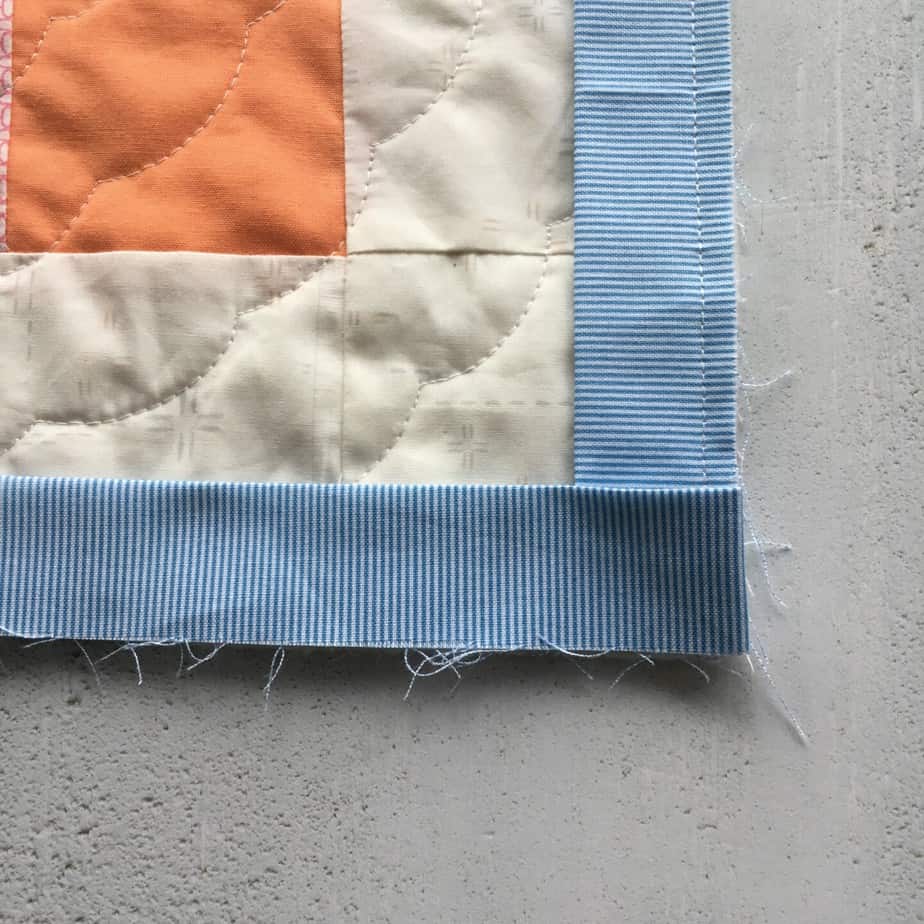 Follow this step-by-step tutorial to find out how to cut, join and attach binding to a quilt for a perfect finish.