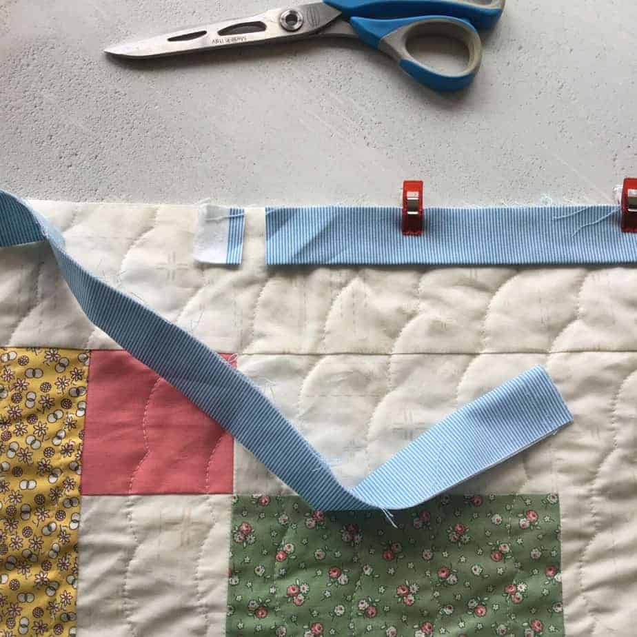 Follow this step-by-step tutorial to find out how to cut, join and attach binding to a quilt for a perfect finish.